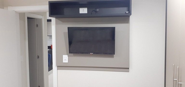 Apto central 2 quartos garagem e máquina de lavar