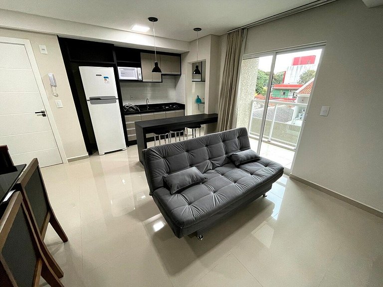 Novo central 2 quartos wifi/garagem/elevador