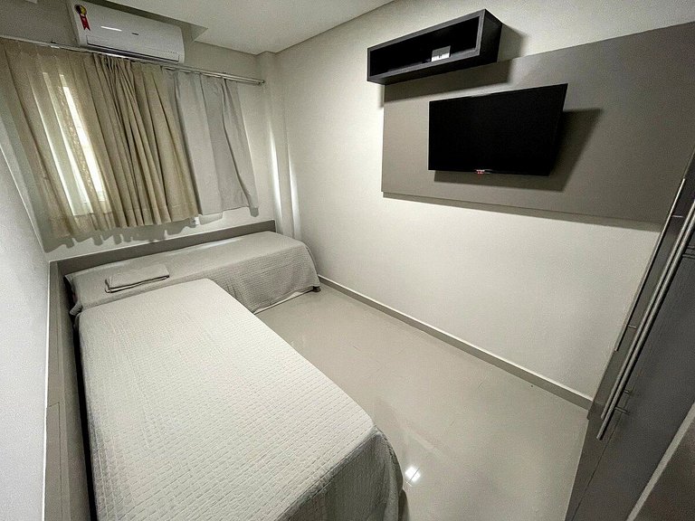 Novo central 2 quartos wifi/garagem/elevador