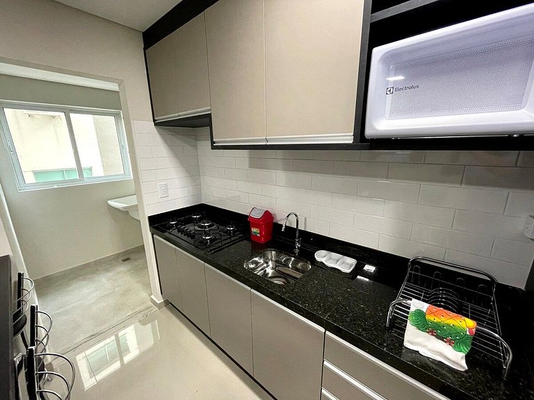 Novo central 2 quartos wifi/garagem/elevador
