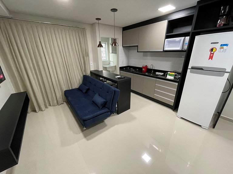 Novo central 2 quartos wifi/garagem/elevador