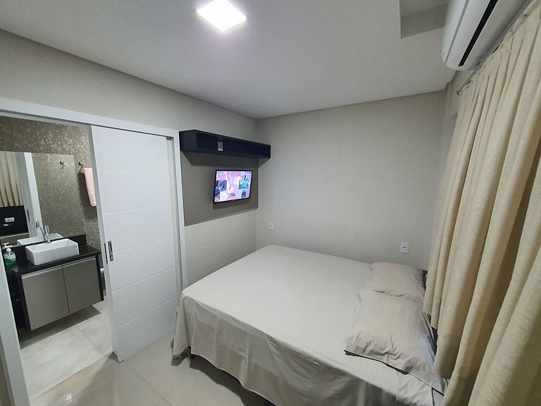 Novo central 2 quartos wifi/garagem/elevador