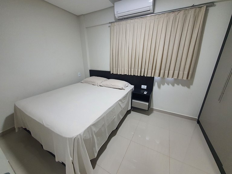Novo central 2 quartos wifi/garagem/elevador