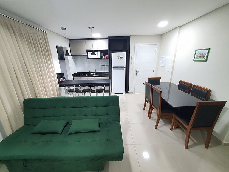 Novo central 2 quartos wifi/garagem/elevador