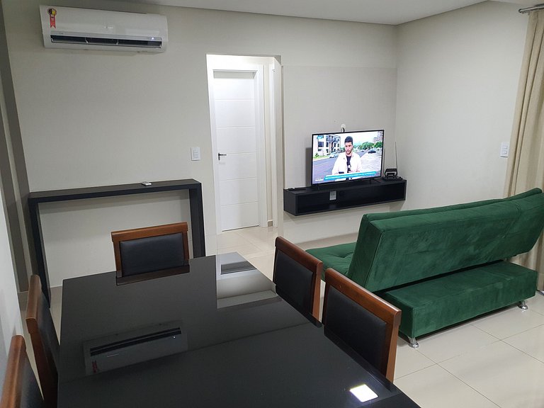 Novo central 2 quartos wifi/garagem/elevador
