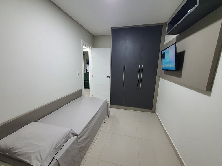 Novo central 2 quartos wifi/garagem/elevador