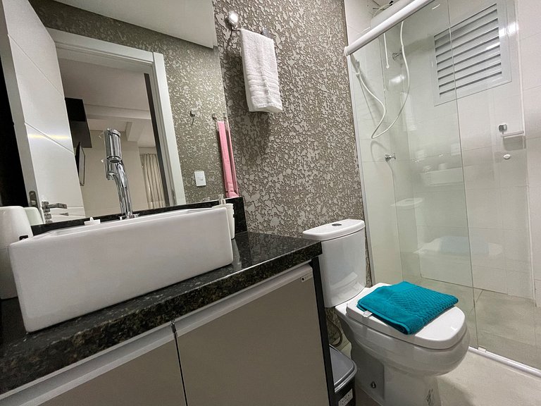 Novo central 2 quartos wifi/garagem/elevador