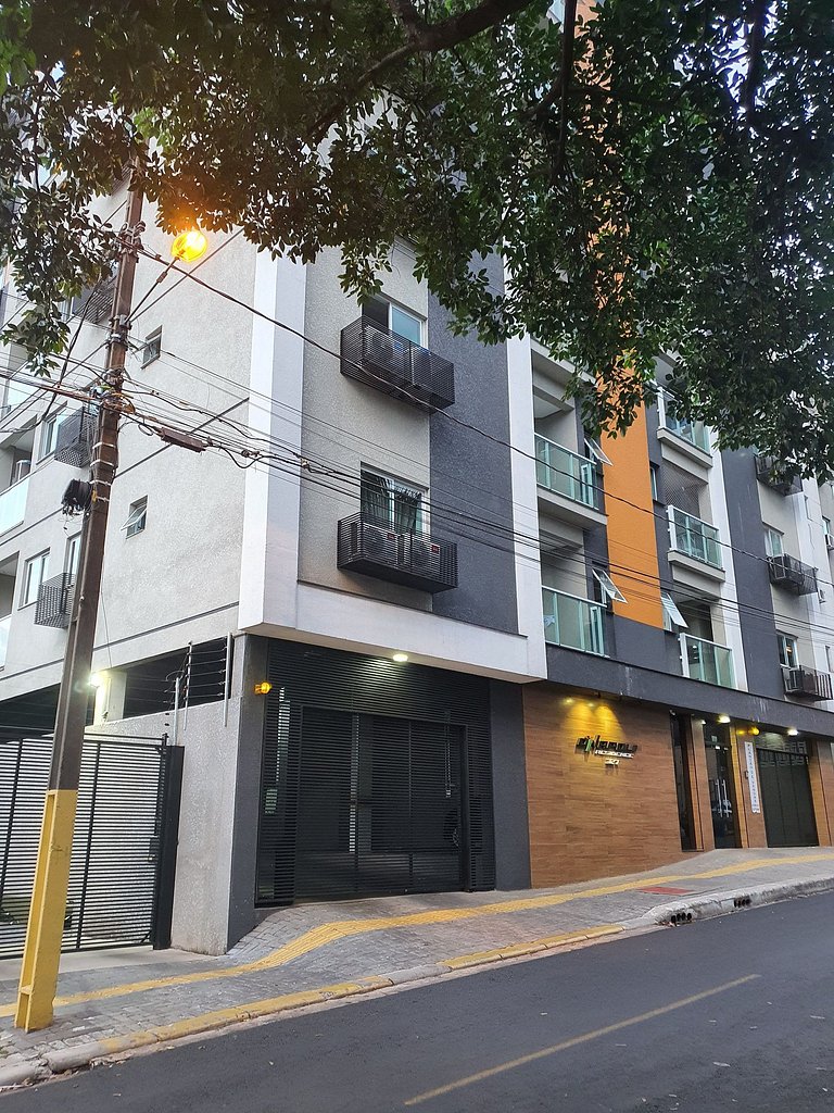 Novo central 2 quartos wifi/garagem/elevador