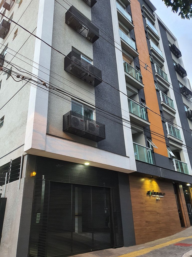 Novo central 2 quartos wifi/garagem/elevador